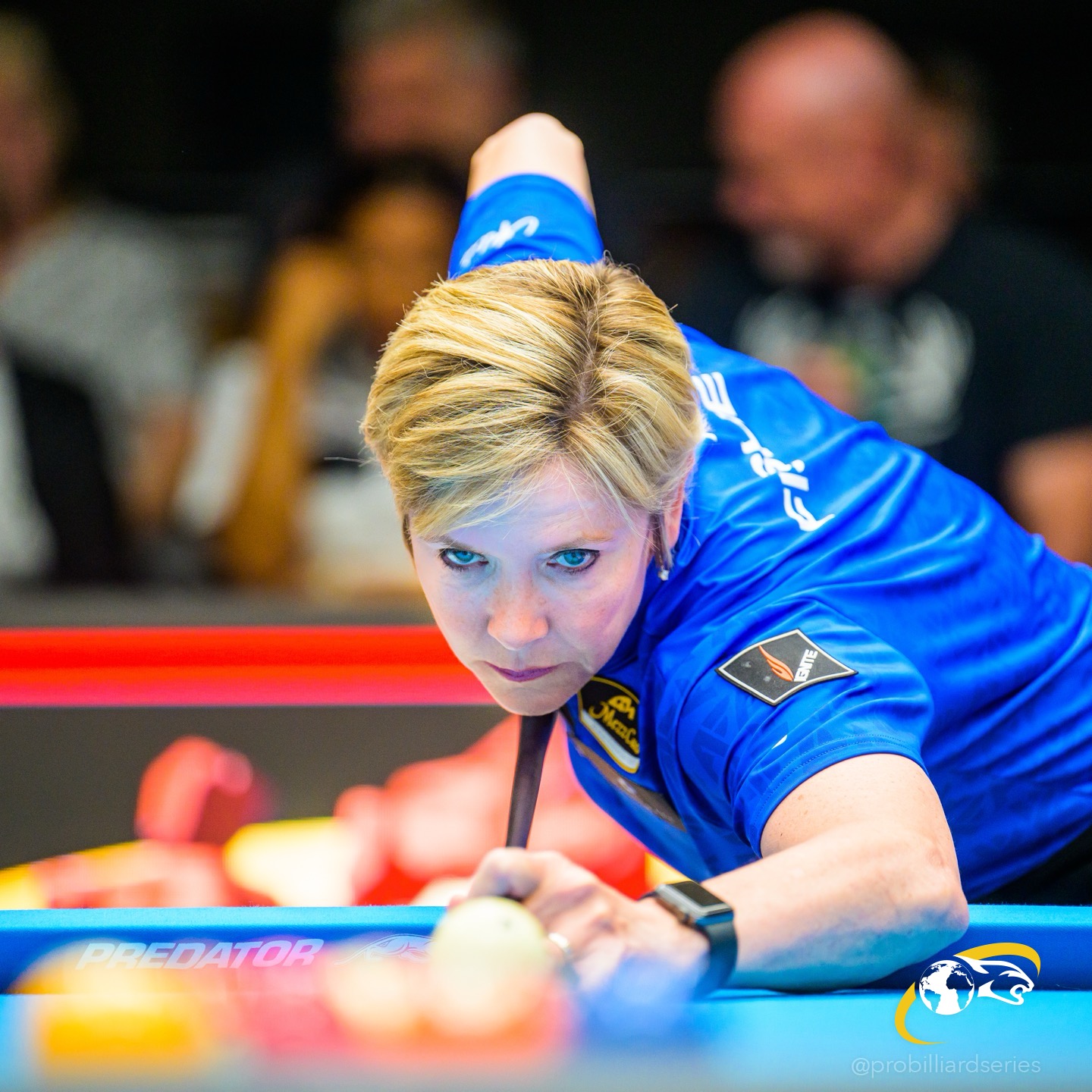 Allison Fisher in blue competition shirt